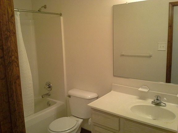 Full bath located in hallway.