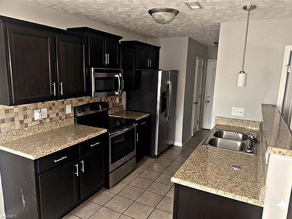 3rd image of 6800 Woodmark Dr