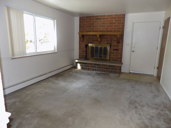 Living Room w/Wood Fireplace