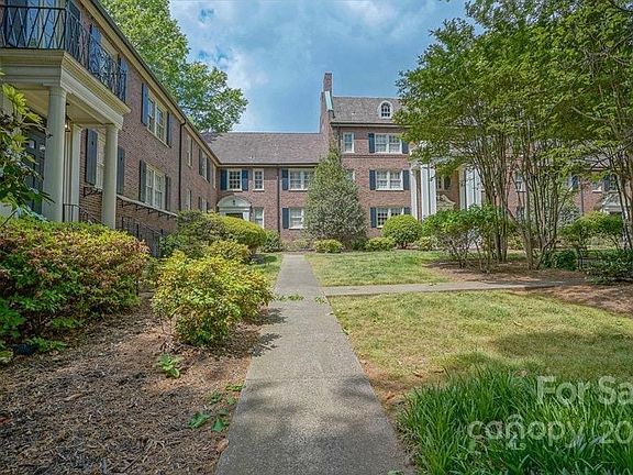 walking up to building entrance.. see the gorgeous courtyard!