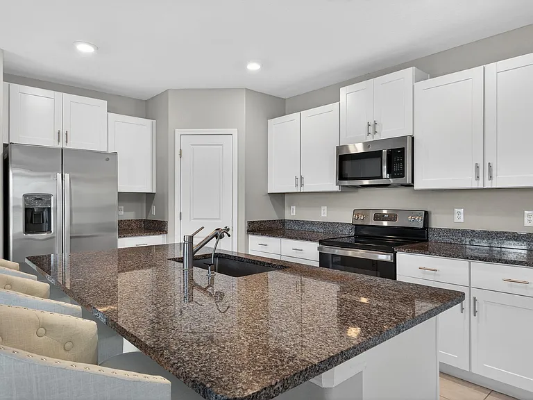 9909 Calypso Orchid Ct — Photo 40