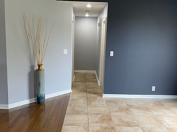 Foyer and Dining room will be new LVP flooring and new dining room light fixtures