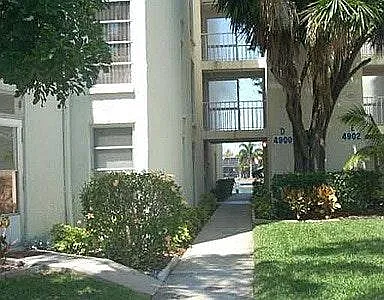 Walk way to entrance of building D and dock. Front door entrance inside.