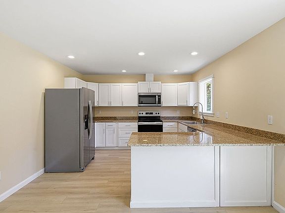 3rd image of 48400 Roaring Rapids Way