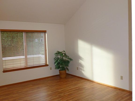 Living Room with vaulted ceilings & skylights