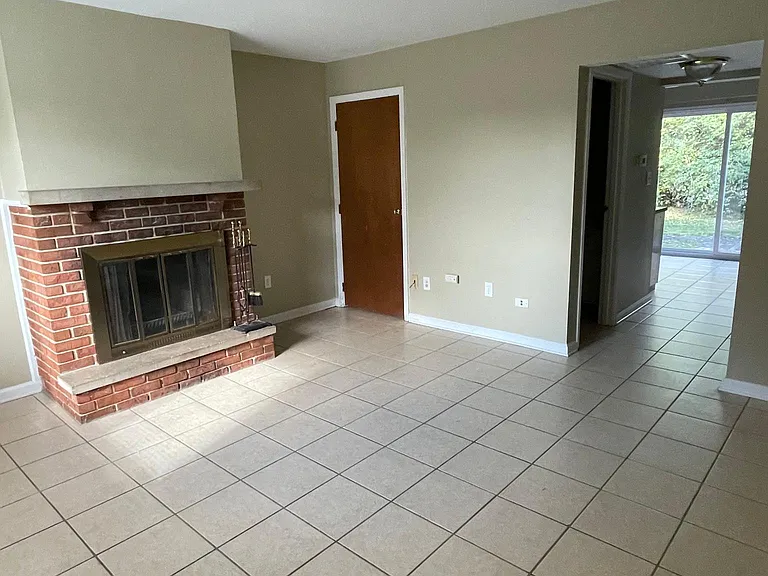 Front room with wood burning fireplace