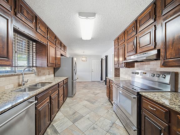 2nd image of 5811 E 61st Pl