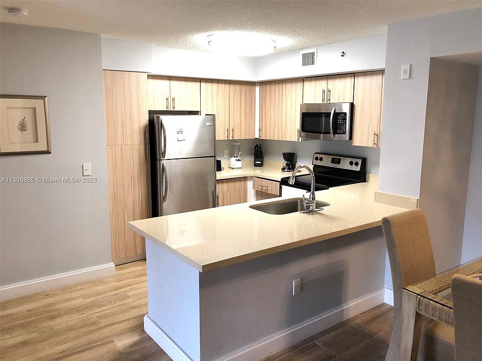 1st image of 19801 E Country Club Dr #4406