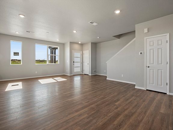 The Woodland floorplan, images taken at Painted Prairie