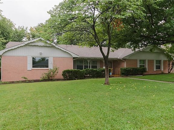 Large older trees, beautiful grass (watered from your own well). Sewer line has been replaced, nice security system, and large inground storm shelter in garage.