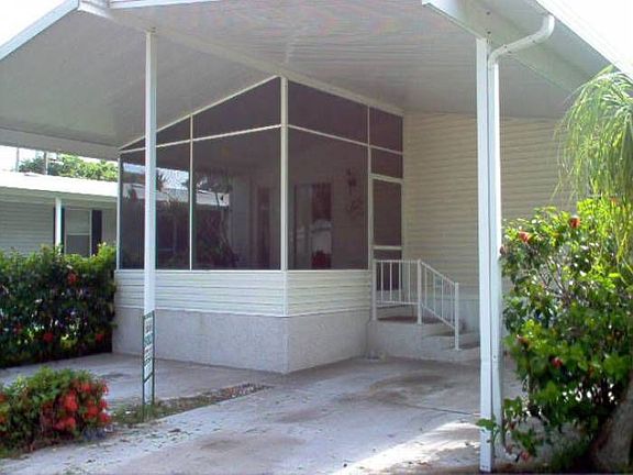 Dualfrt.covd carport/scrd