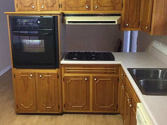 Gas Range and dishwasher in open plan kitchen.