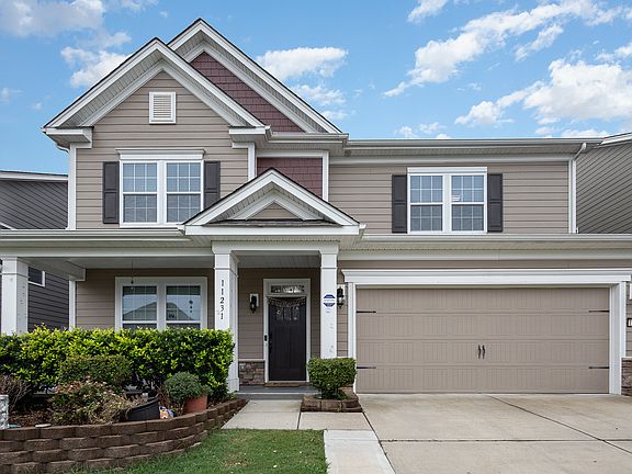 3rd image of 11231 Streamwood Ln NW