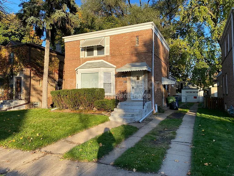 9121 S Utica Ave — Photo 1