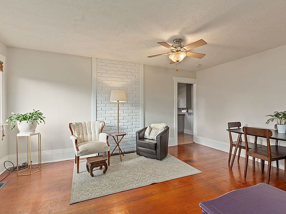 Looking from living room and dining area to the kitchen