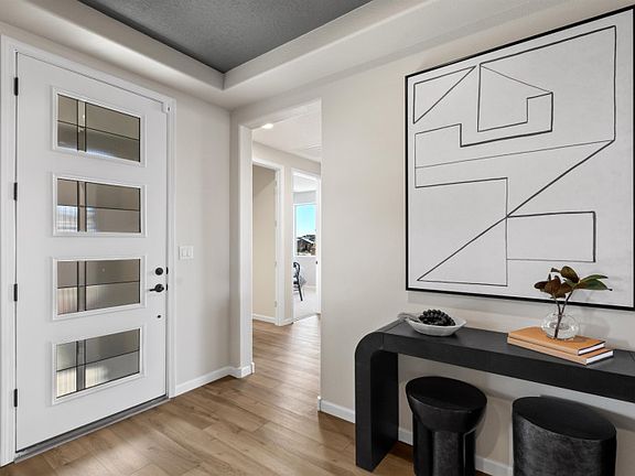 Enter the Parklane model home to a welcoming foyer.