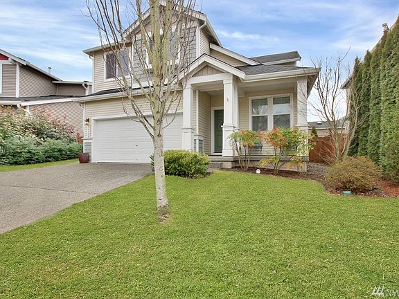Row trees on one front side of home to give a little more privacy.