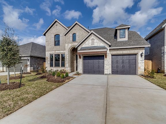 Welcome home to 3442 Acacia Grove Lane located in the master planned community of The Meadows at Imp