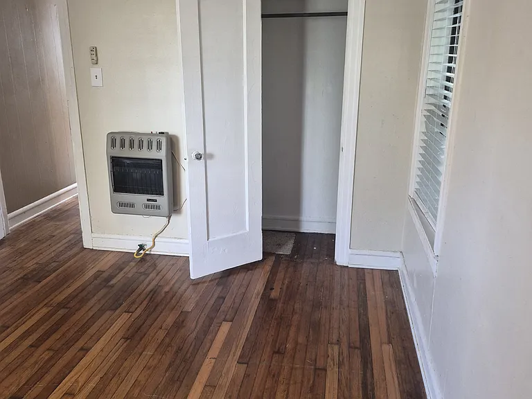 Back Bedroom with closet door open