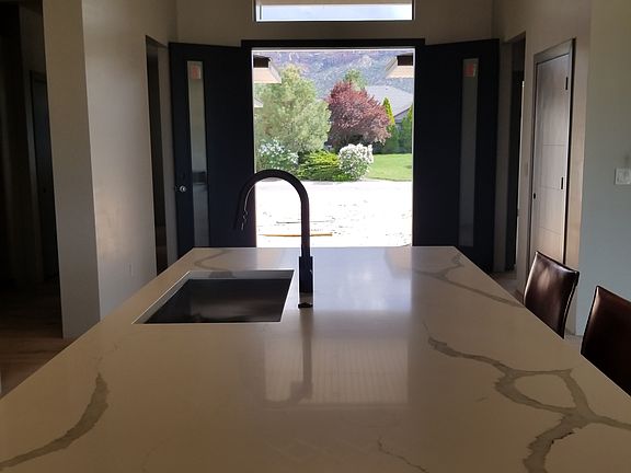Entry opens to kitchen