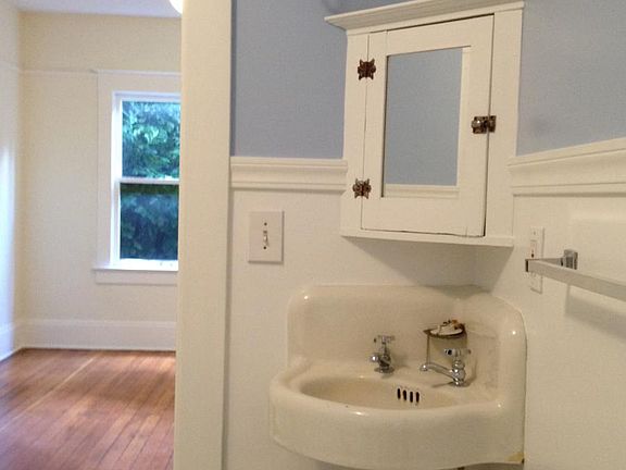 Bathroom features original vintage charm