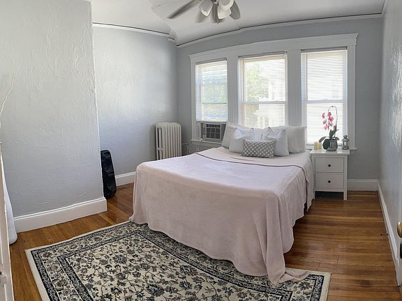 master bedroom - queen sized bed. fits two end tables comfortably; 1 dresser bureau