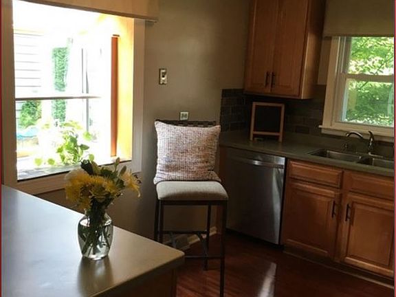 MAPLE CABINETS, CORIAN & S/S