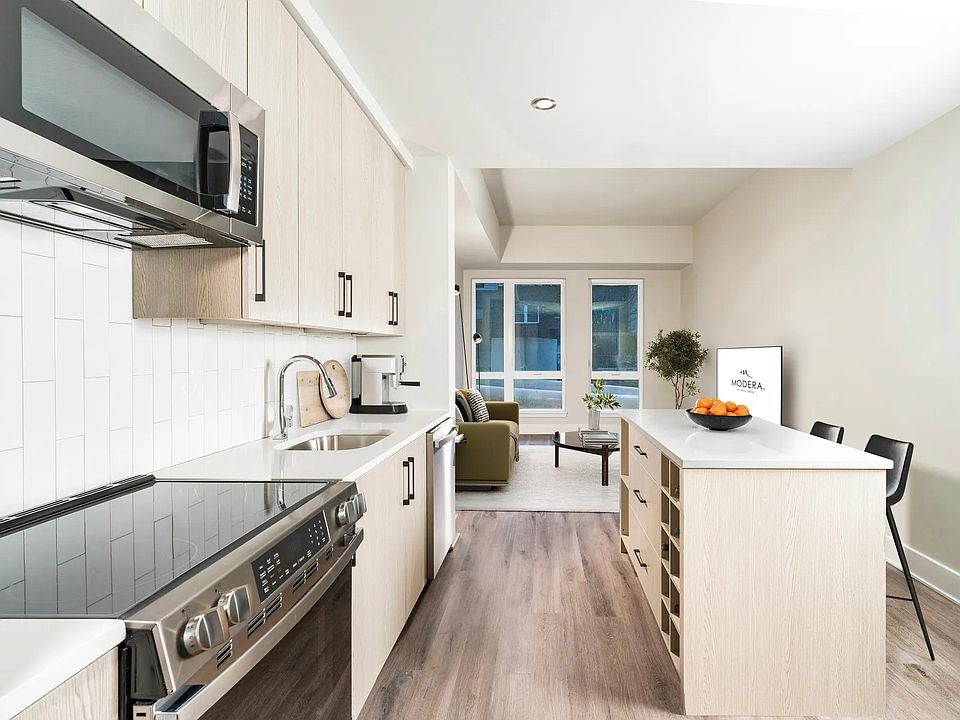 Stylish and functional moveable kitchen island with built-in storage.