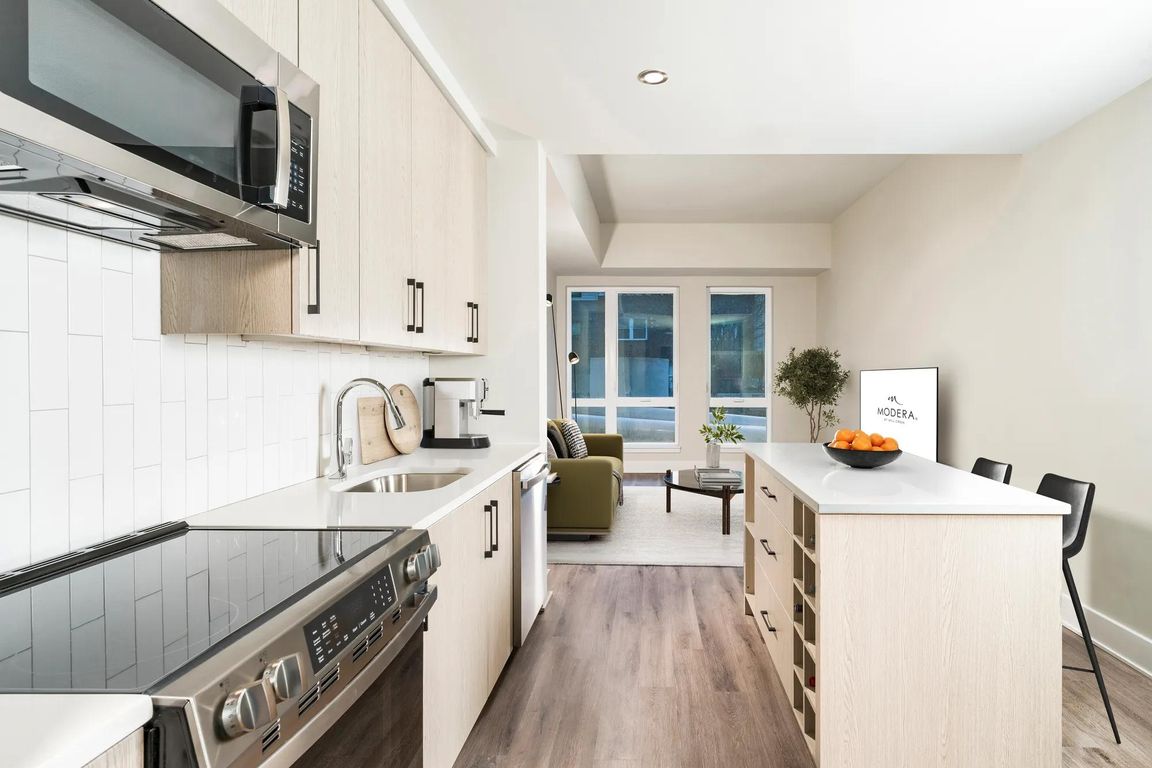 Stylish and functional moveable kitchen island with built-in storage.