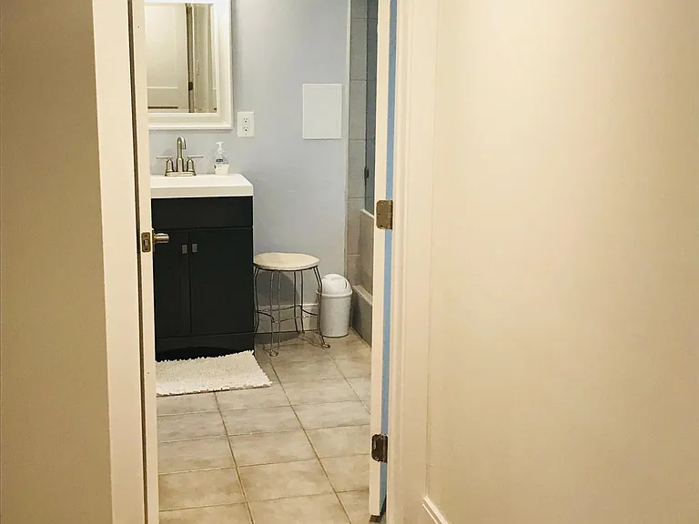 Entrance to bathroom from living room hallway