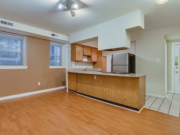Living room looking into kitchen