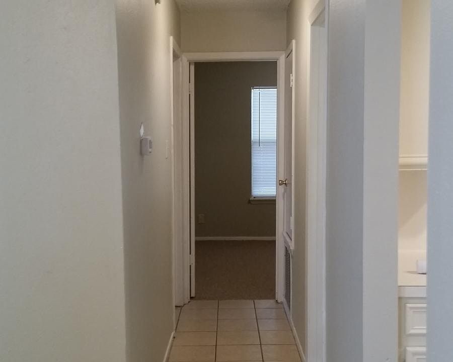 Newly painted hallway to bathroom and bedrooms.