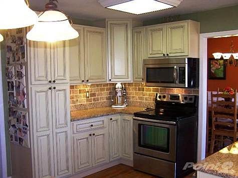 Custom cabinets and Stainless appliances