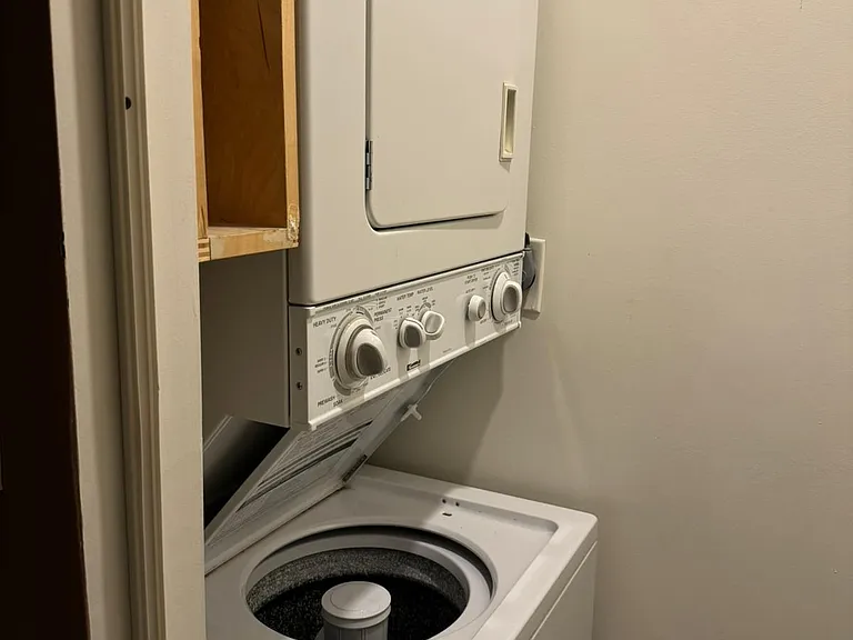 Convenient stacked in-unit washer and dryer.