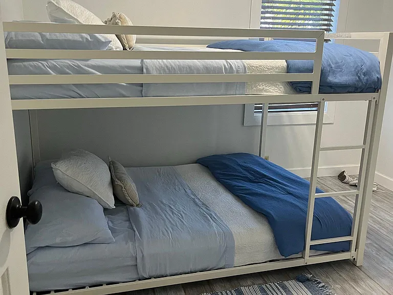 Full size bunk beds in guest bedroom.