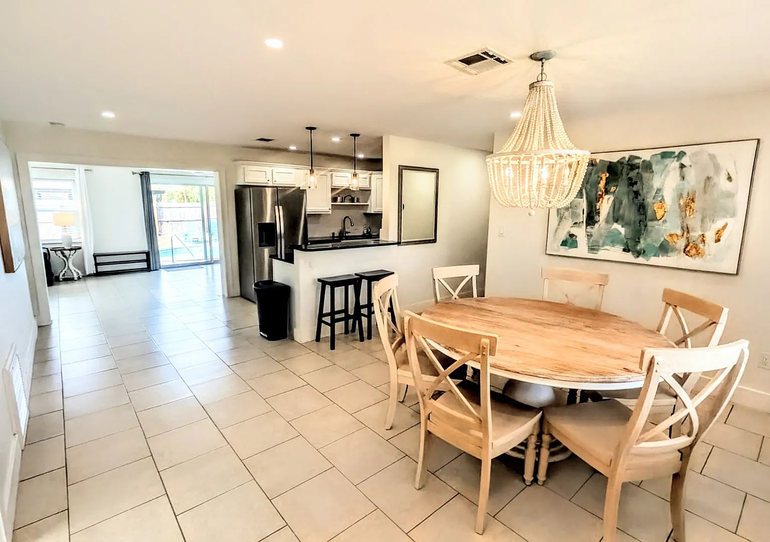 Short-Term Vacation Rental Updated 4-Bedroom Pool Home With Spacious Living Areas — Photo 3