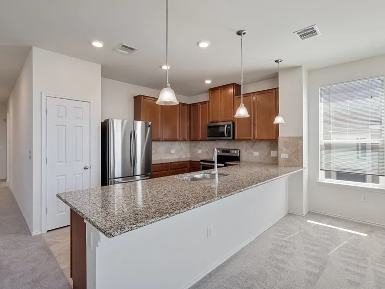 7712 Peccary Dr — Photo 13