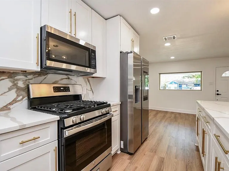 6834 Saint Augustine St — Photo 7