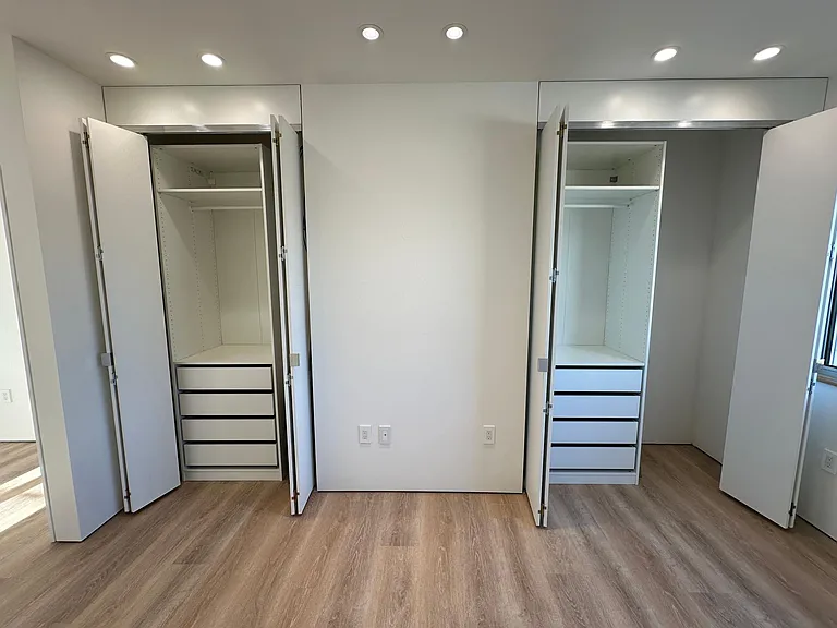 Tons of built-in clothes storage in each bedroom.