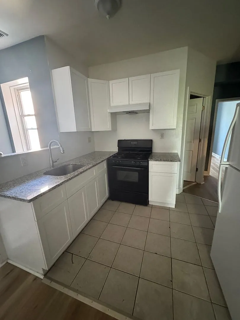 4716 Woodland Ave. — Photo 1