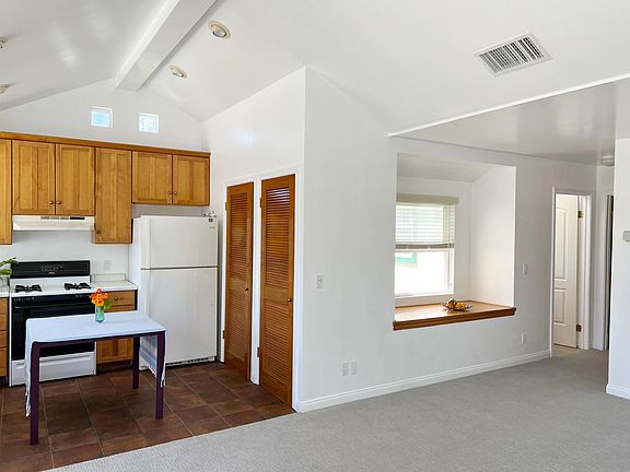Standing inside entrance door