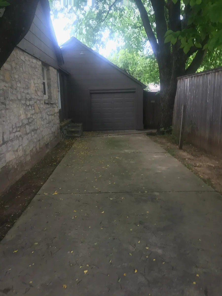 Side of the home leading to the single-car garage - 5532 S Peoria Ave #A