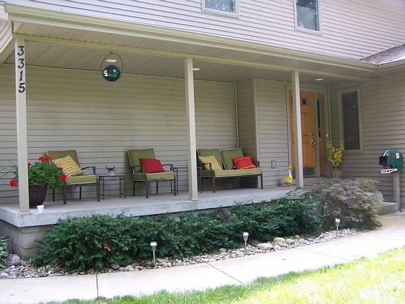 The covered front porch keeps you away from natures elements.