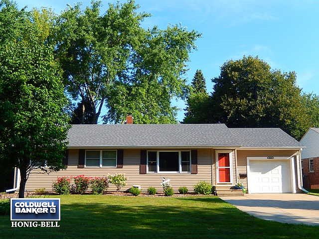 Front Exterior.  New Landscape. New roof. New vinyl siding.  Extened cement driveway.