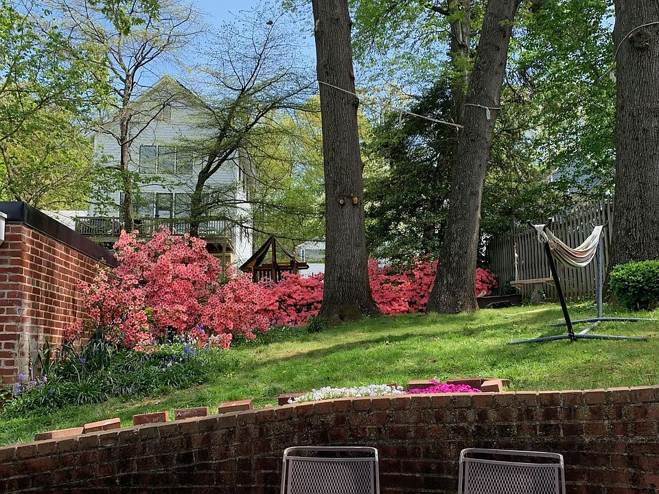 Beautiful backyard space provides a garden-like ambiance.