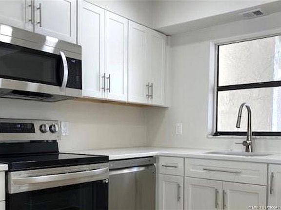 4th image of 1950 SW Palm City Rd APT 4201