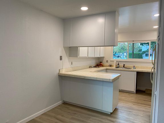 Kitchen with east facing large window