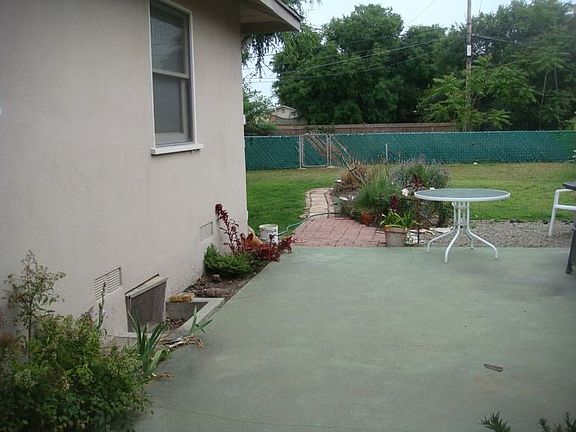 Other half of patio looking out to back yard.