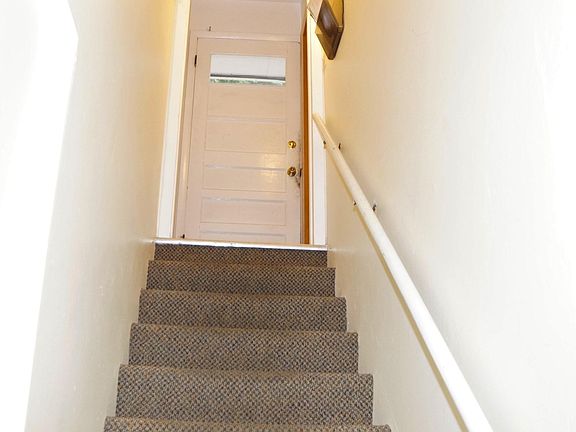 441 basement apt entrance and stairway down to lockable apt door