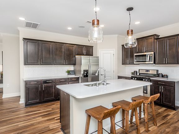 Open Kitchen with large island and walk-in pantry